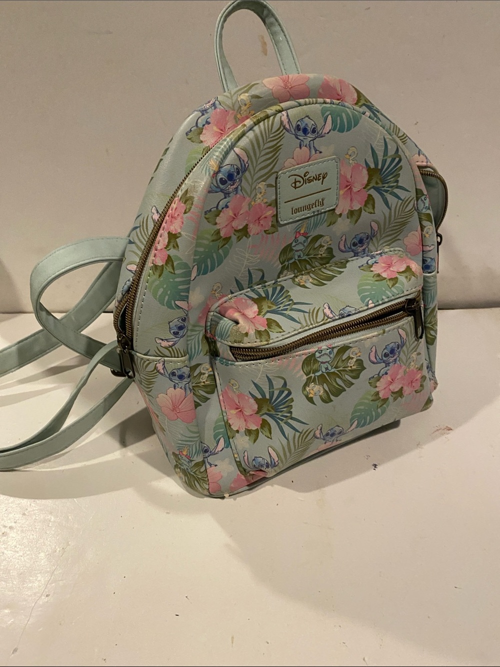 Loungefly Disney Lilo & Stitch Tropical
Floral Mini Backpack